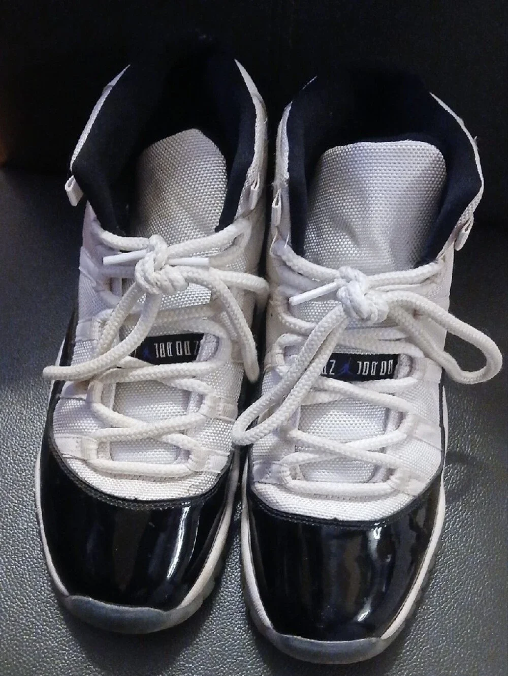 Kids White and Black Jordan High-Top Sneakers